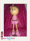 Boneca rosa e marrom